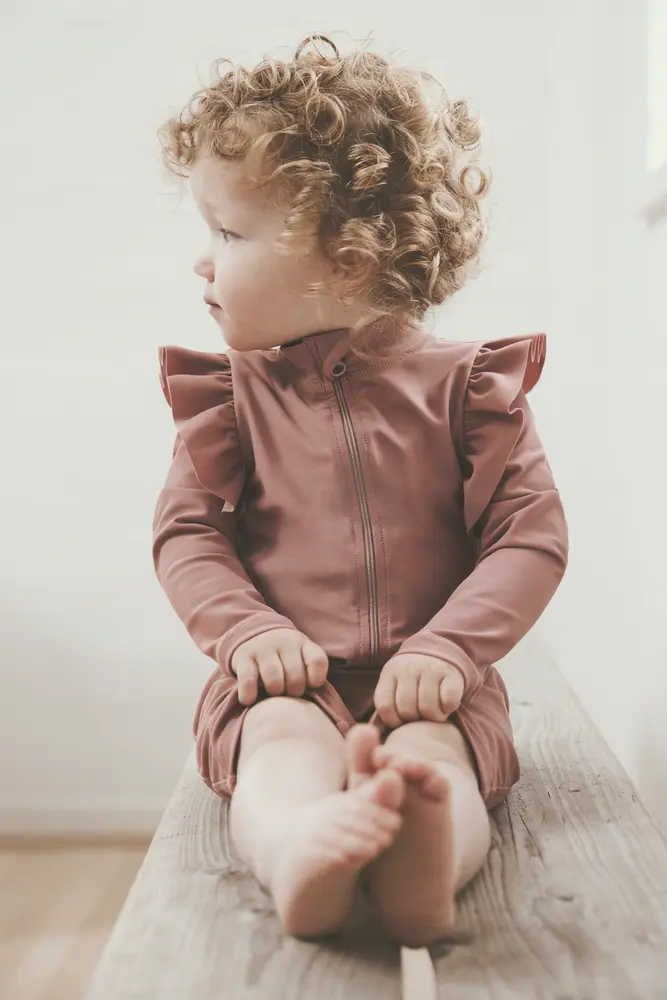 Badedragt Solid   Uv 60+   Ash Rose   80 fra Huttelihut